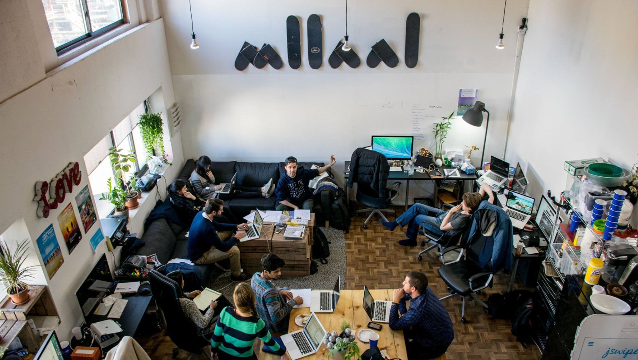The MLLNNL studio space with the team working